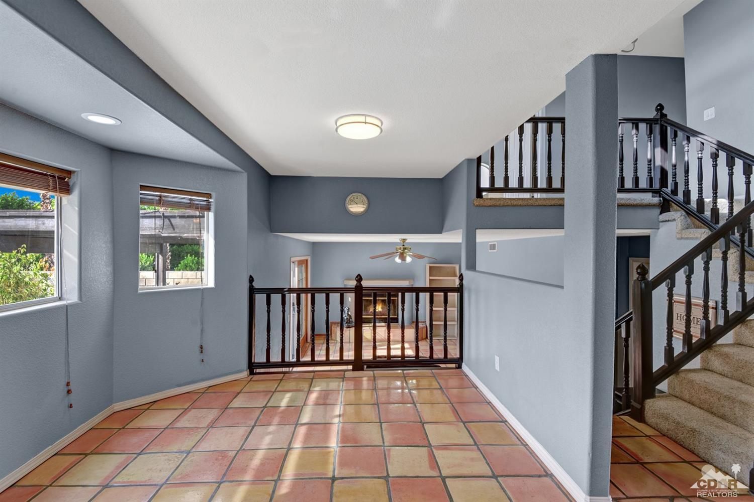 68889 Risueno Road Cathedral City, CA 92234 - Photo 5 of 29 a view of a hallway with windows