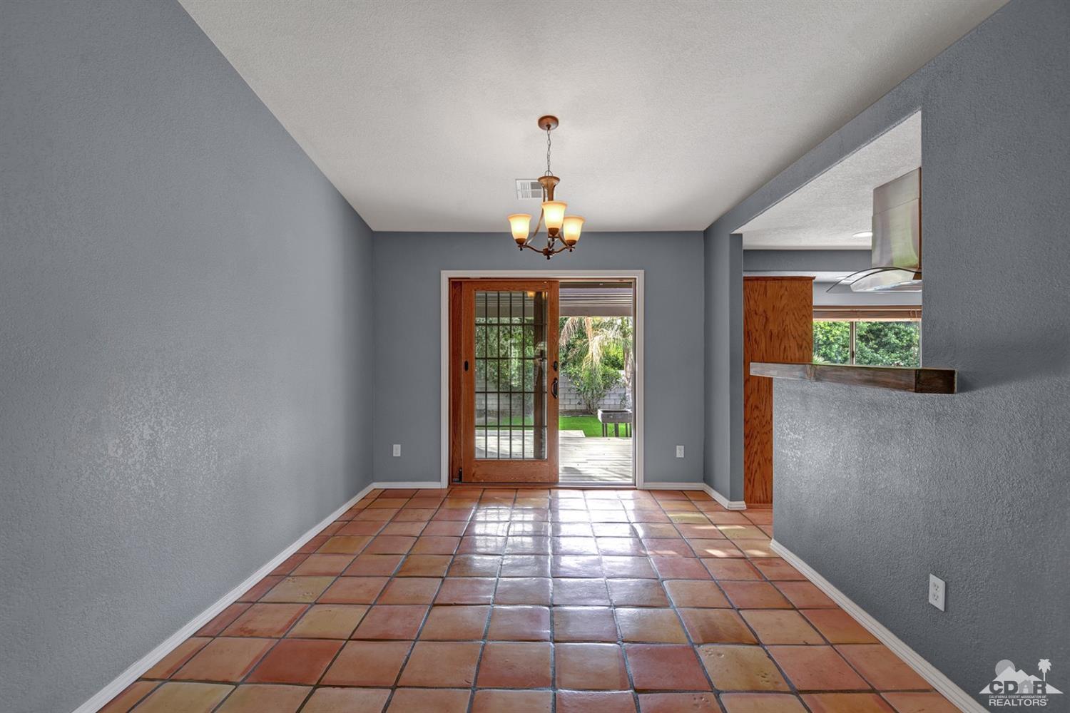68889 Risueno Road Cathedral City, CA 92234 - Photo 6 of 29 a view of a hallway with windows