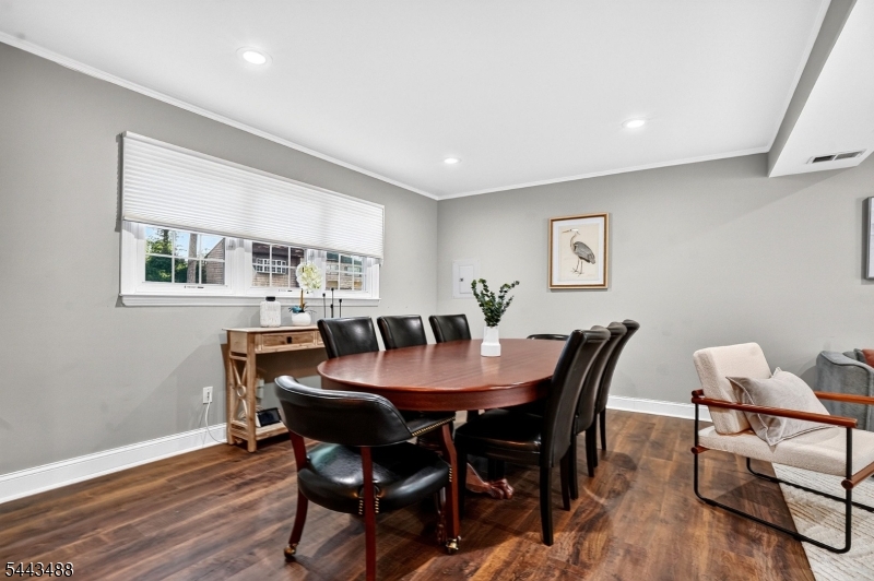 151 East Prospect Street Clark, NJ 07066 - Photo 14 of 31 a view of a dining room with furniture and wooden floor