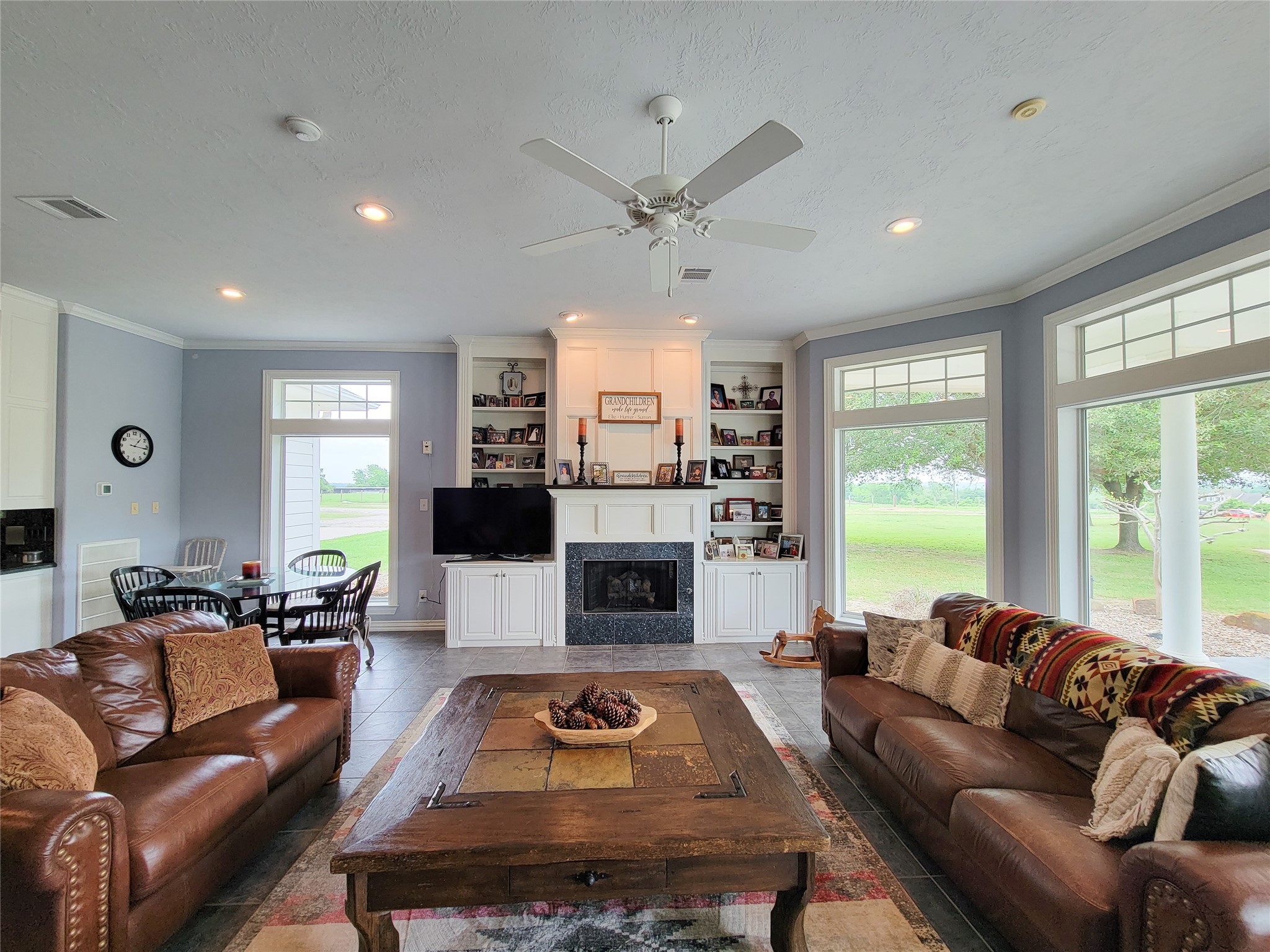 939 Old Nelsonville Road Bellville, TX 77418 - Photo 14 of 50 a living room with furniture fireplace and window
