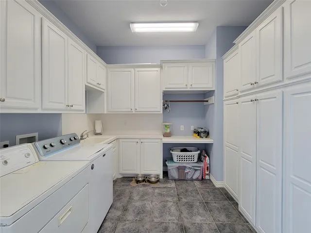 a view of a backyard with swimming pool