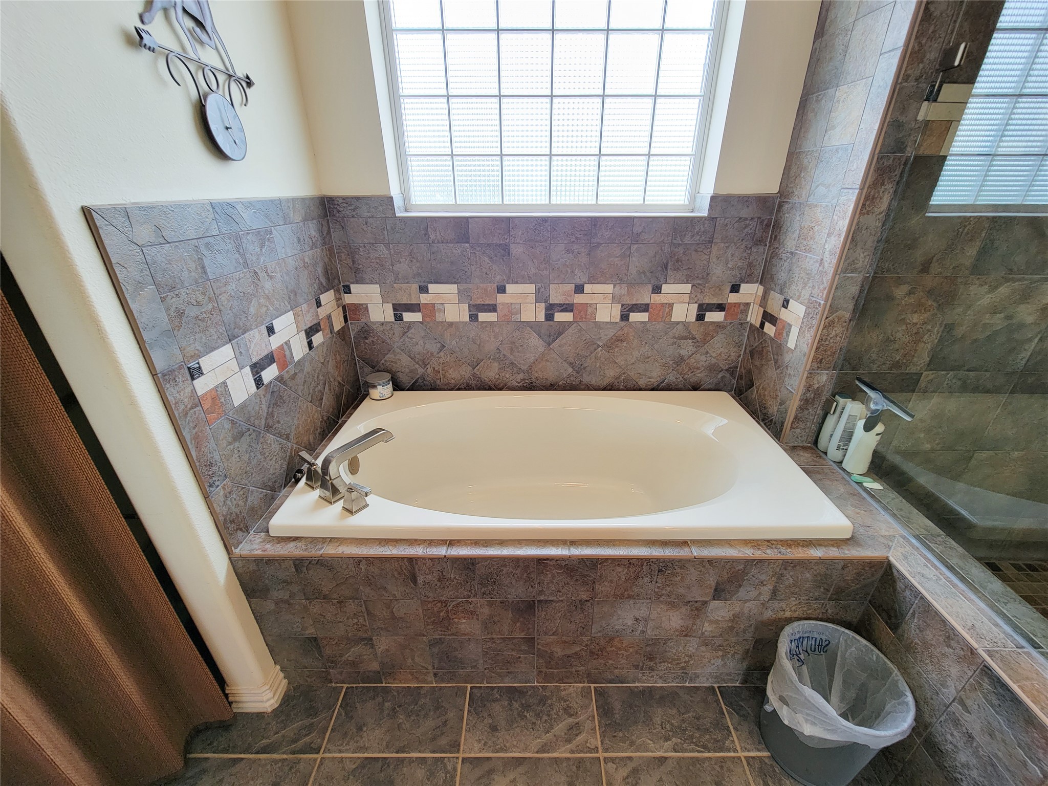 939 Old Nelsonville Road Bellville, TX 77418 - Photo 29 of 50 a bathroom with a bathtub