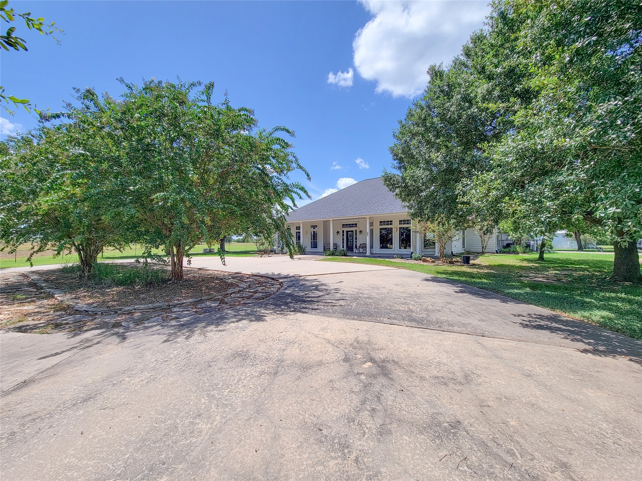 939 Old Nelsonville Road Bellville, TX 77418 - Photo 4 of 50 a front view of house with yard and green space