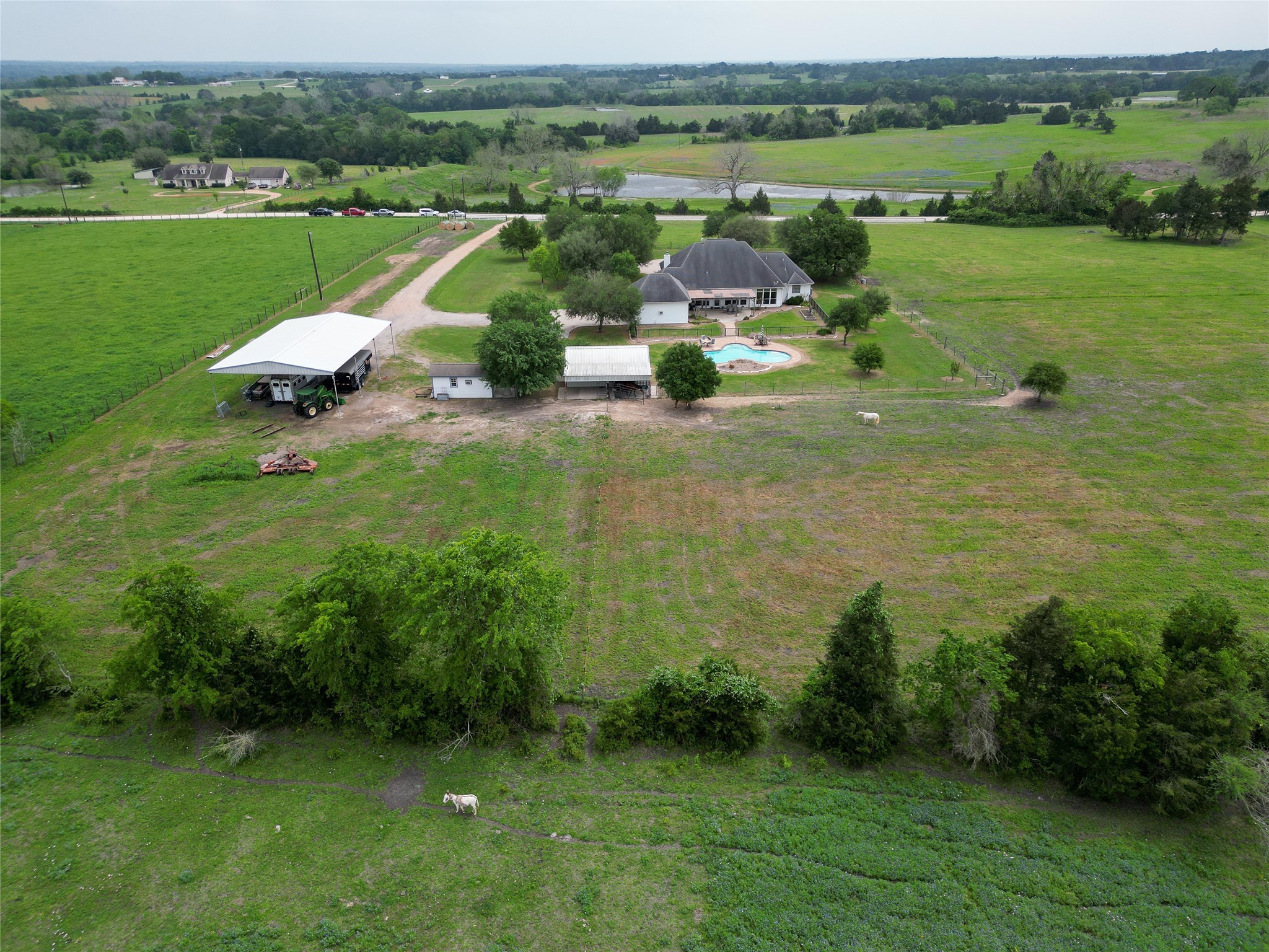 939 Old Nelsonville Road Bellville, TX 77418 - Photo 46 of 50 a view of a lake with a building in the background