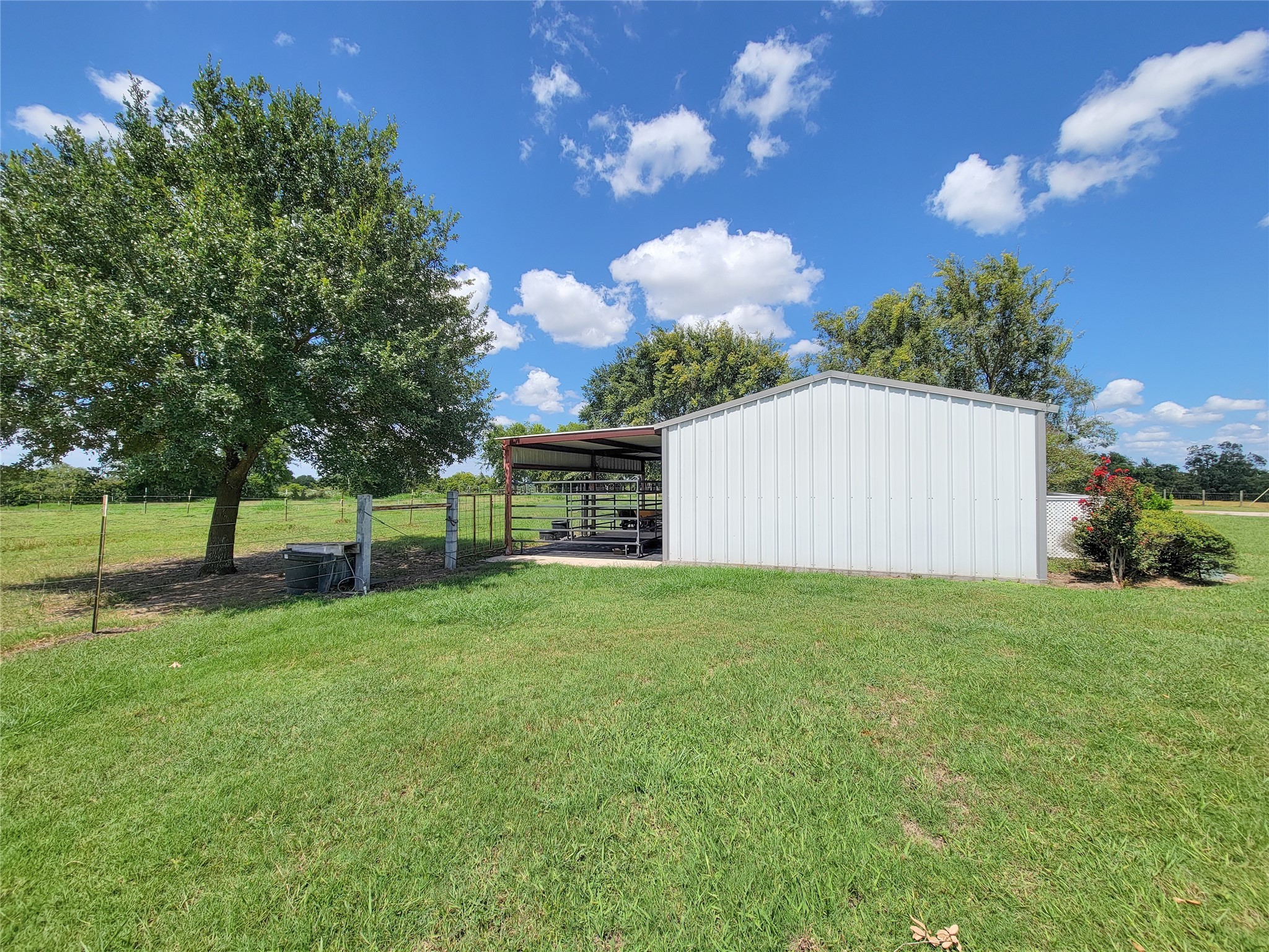 939 Old Nelsonville Road Bellville, TX 77418 - Photo 49 of 50 a view of a backyard with large trees