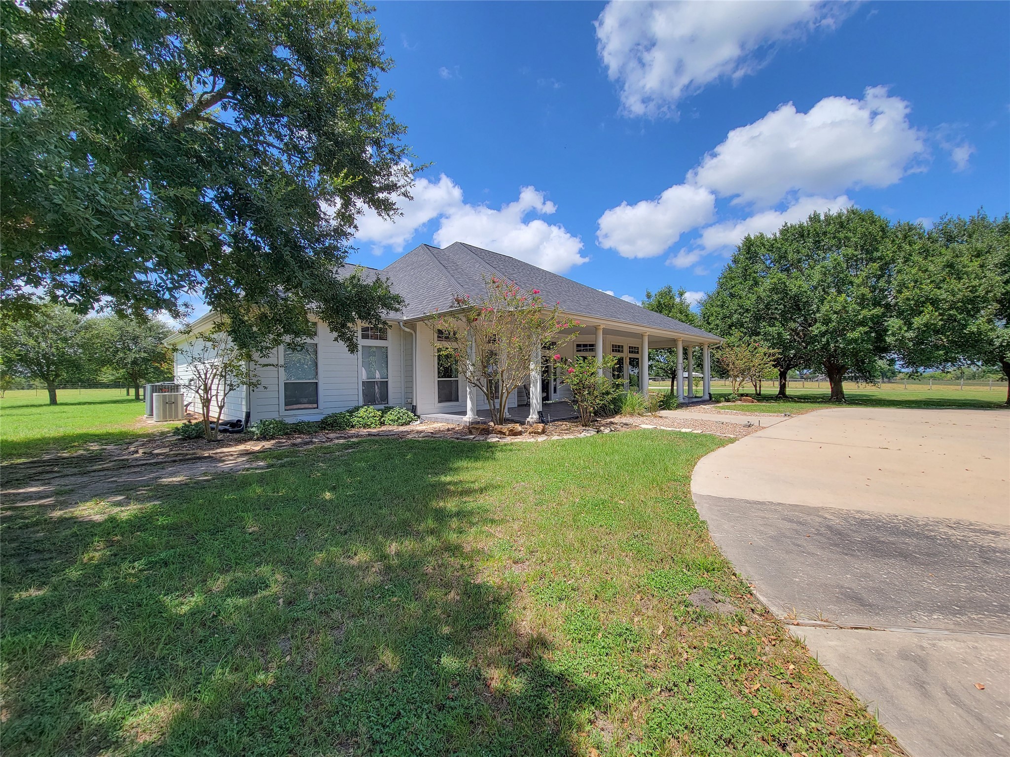 939 Old Nelsonville Road Bellville, TX 77418 - Photo 5 of 50 a view of a house with a big yard