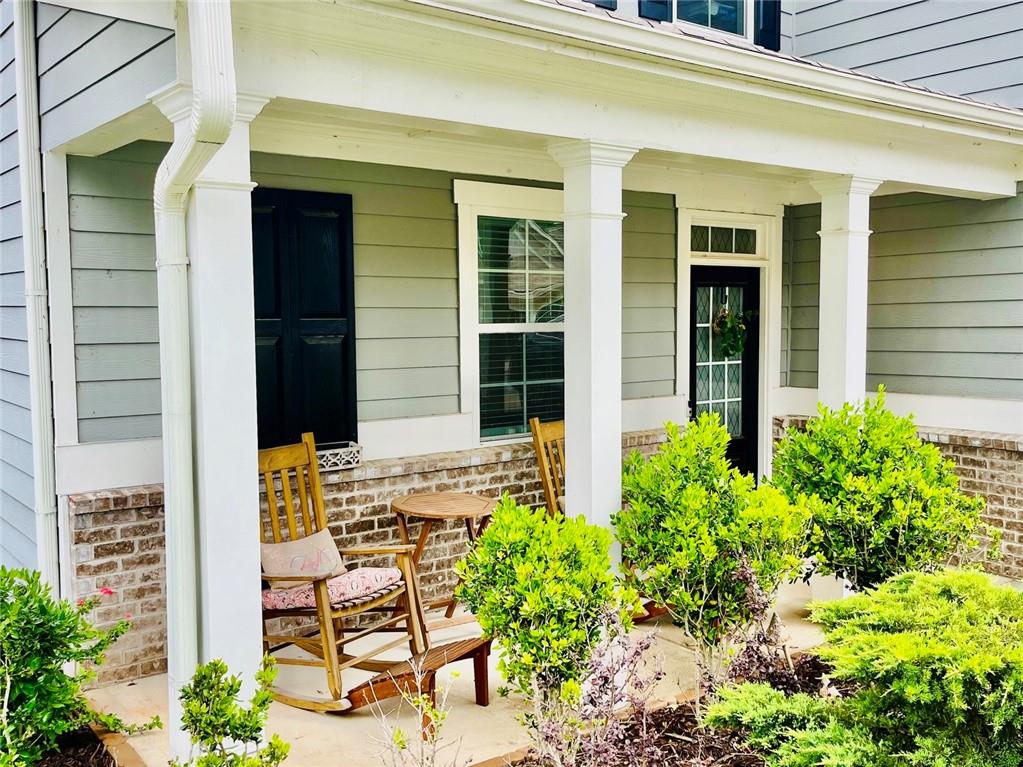 3015 Winding Ridge Waleska, GA 30183 - Photo 3 of 40 a view of front door of house with outdoor seating