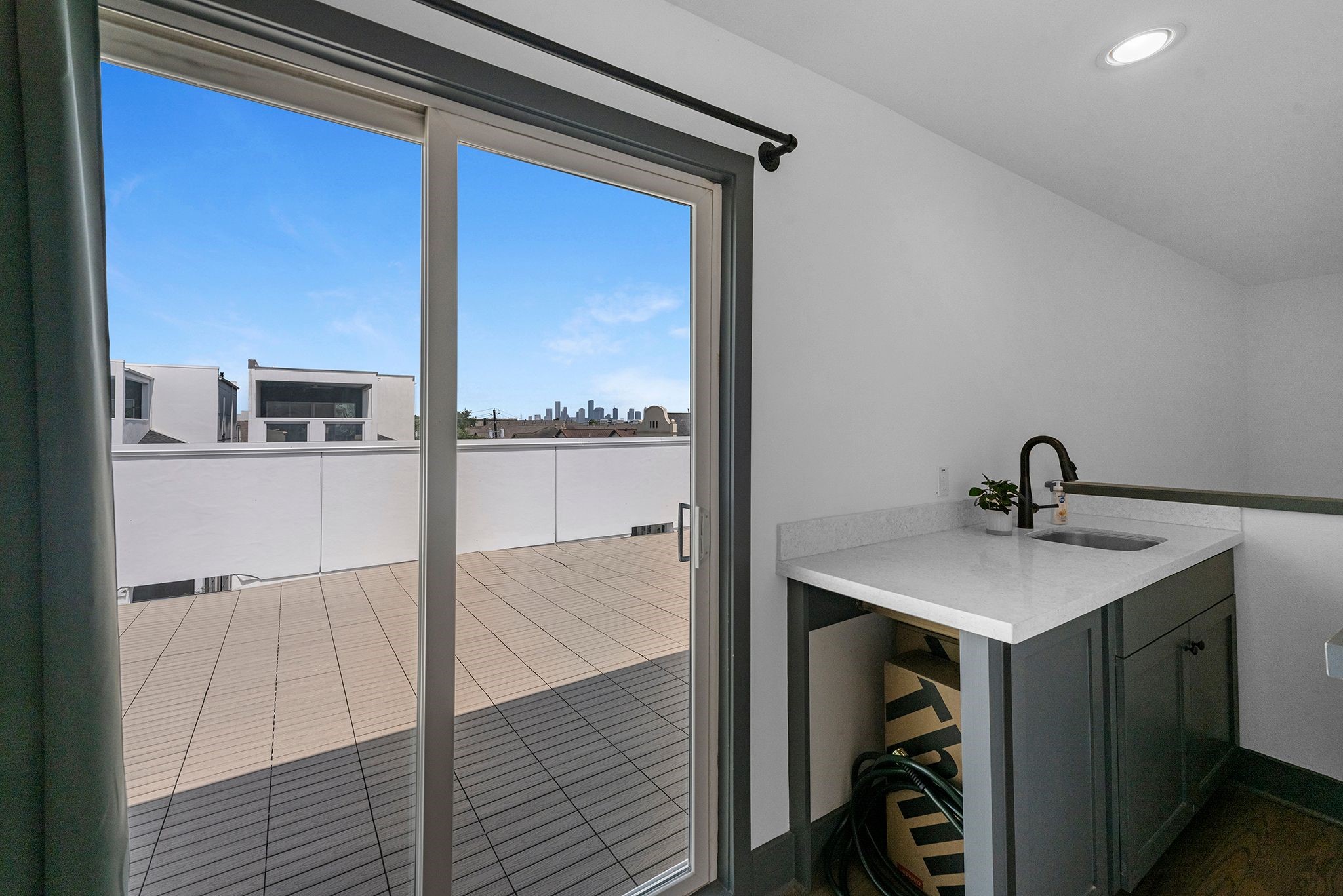 5802 Kansas Street Houston, TX 77007 - Photo 10 of 12 4th Floor includes Sink/ Counter. Sliding Glass door to out side deck