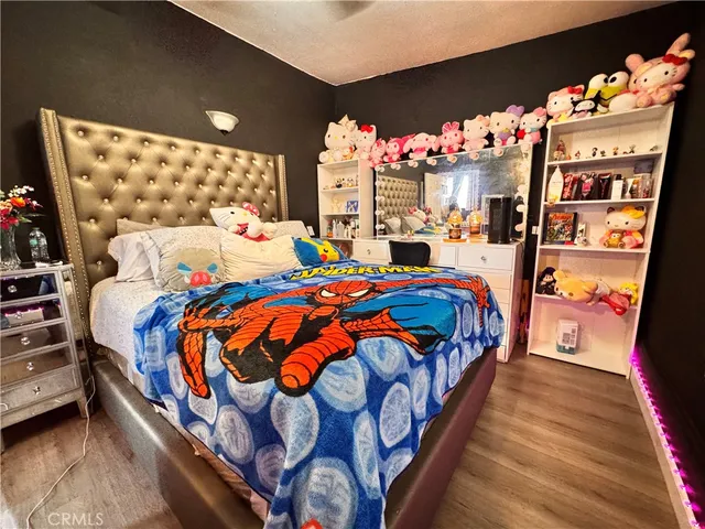 a bathroom with a sink mirror and vanity