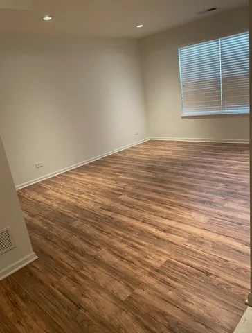 a kitchen with a refrigerator stove and sink