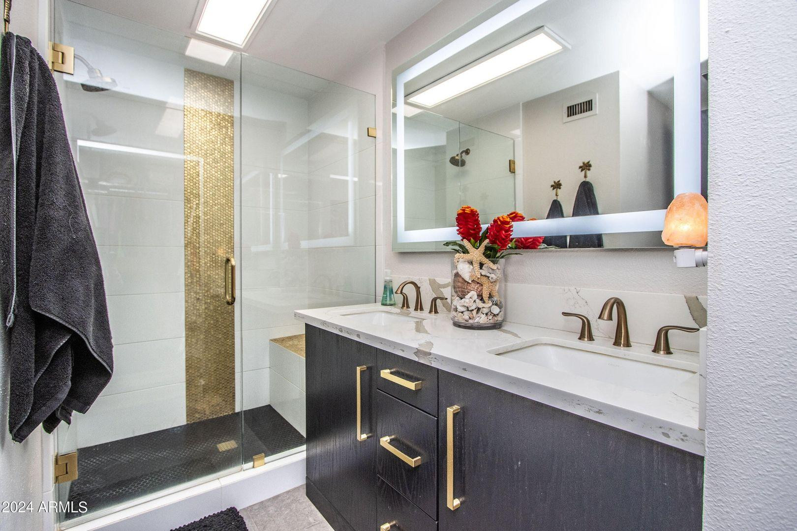 7401 North Scottsdale Road, Unit 3 Paradise Valley, AZ 85253 - Photo 11 of 29 a bathroom with a sink double vanity and a mirror