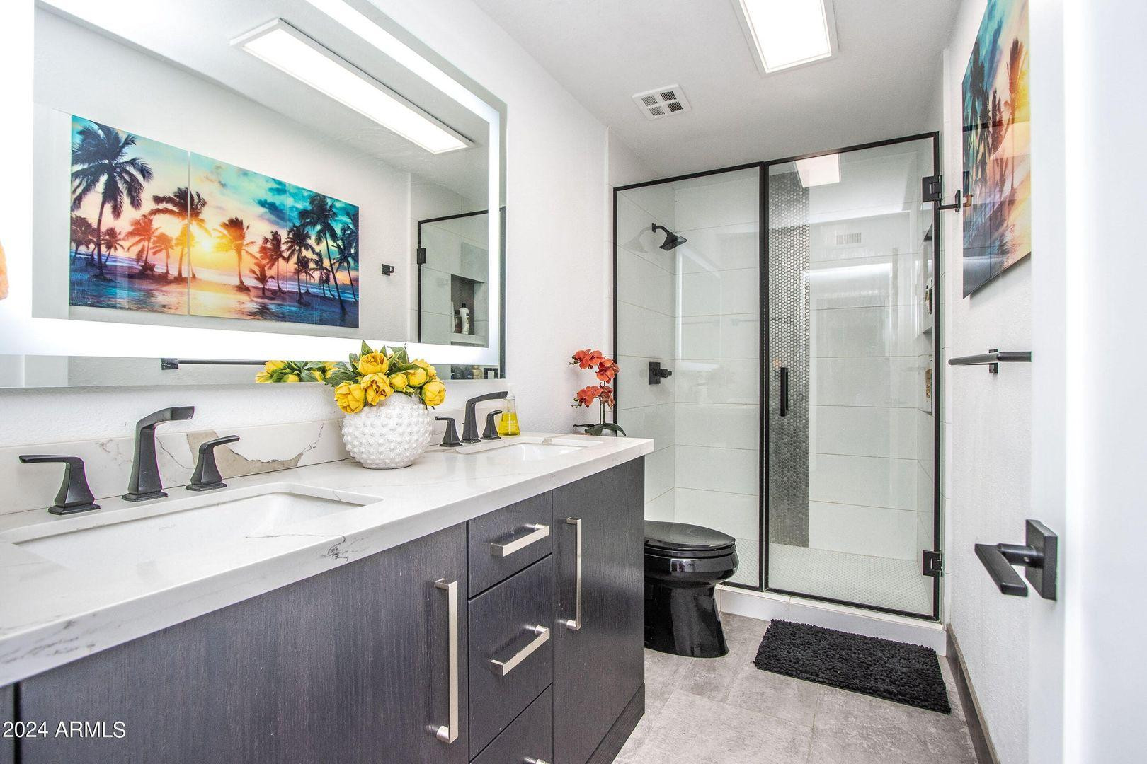 7401 North Scottsdale Road, Unit 3 Paradise Valley, AZ 85253 - Photo 16 of 29 a bathroom with a sink a toilet and shower