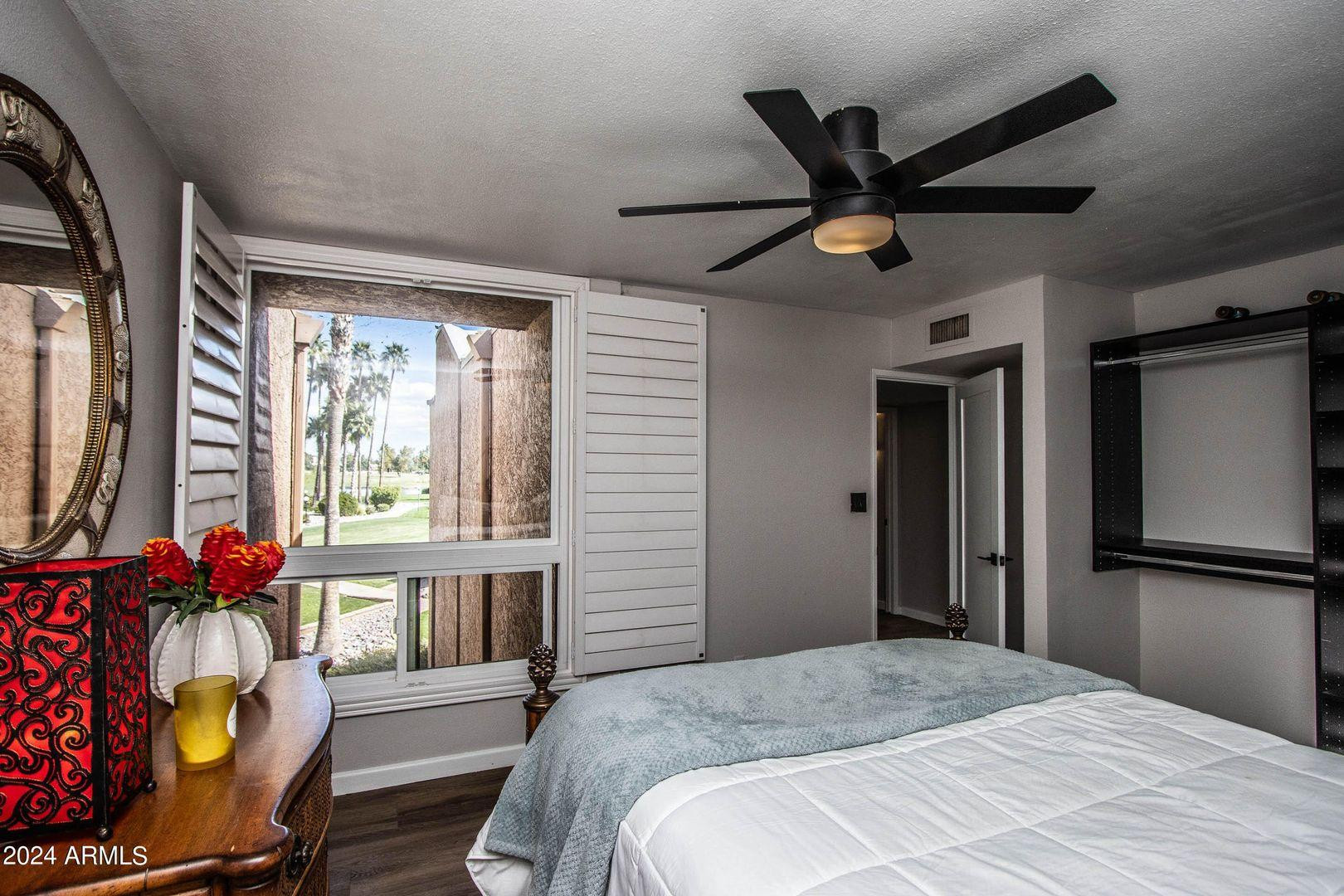 7401 North Scottsdale Road, Unit 3 Paradise Valley, AZ 85253 - Photo 18 of 29 a bedroom with a bed and a window