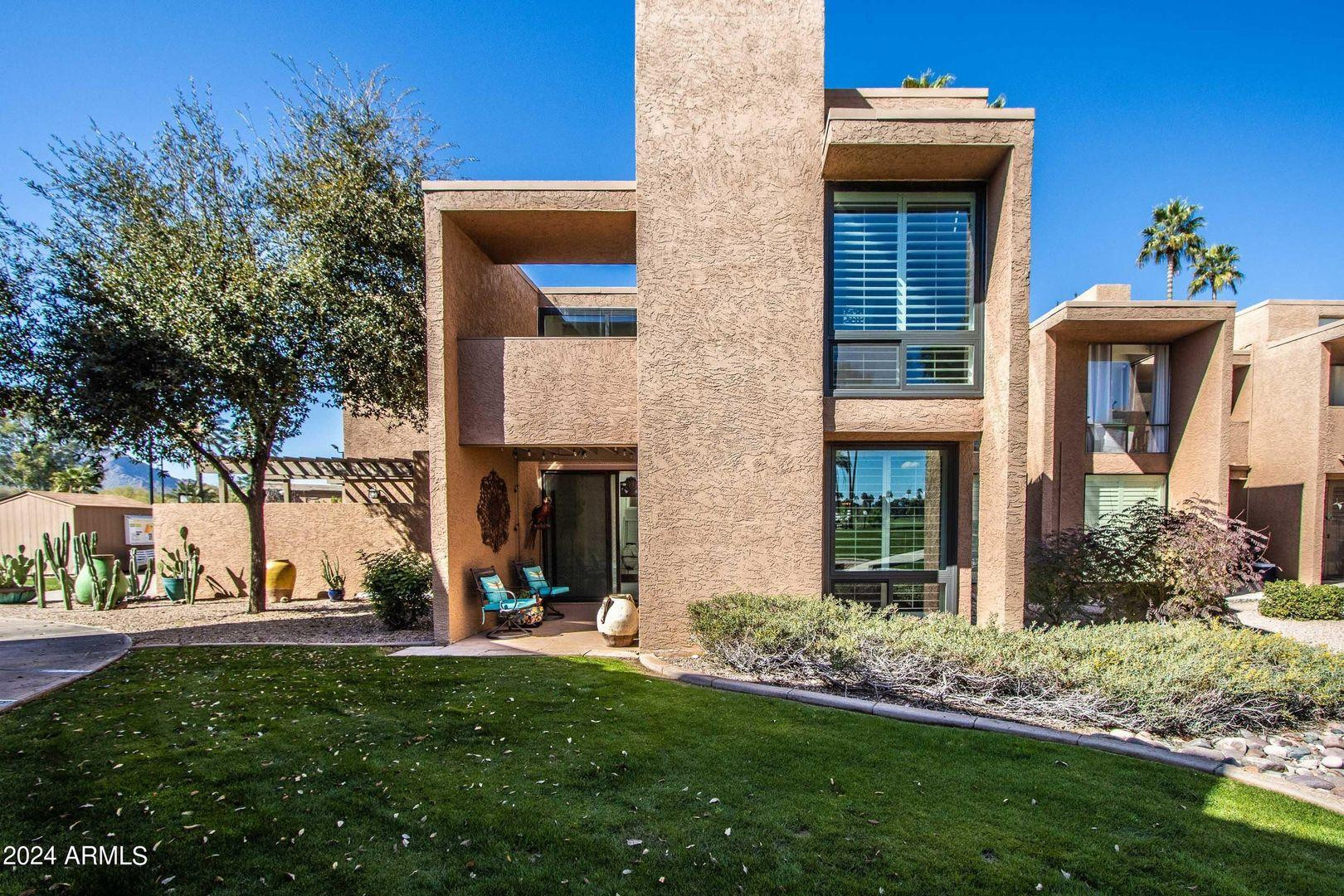 7401 North Scottsdale Road, Unit 3 Paradise Valley, AZ 85253 - Photo 21 of 29 a view of a house with a yard
