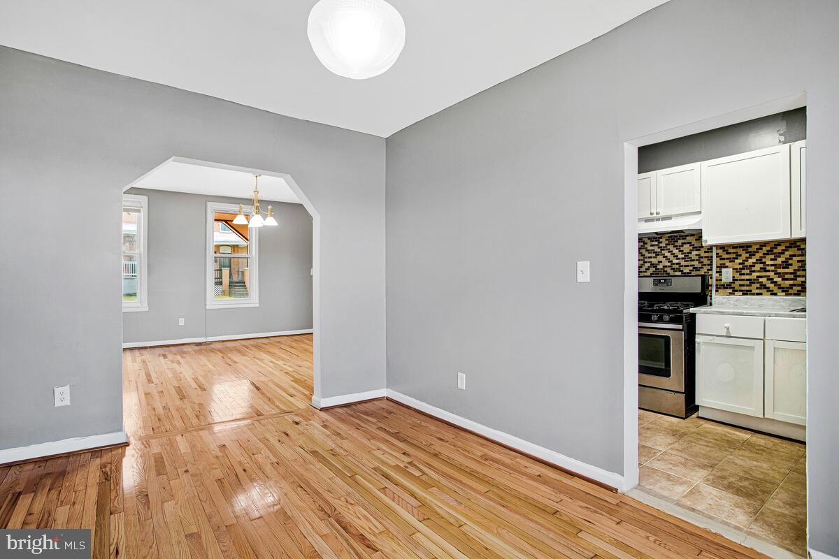 5204 Ivanhoe Avenue Baltimore, MD 21212 - Photo 11 of 38 a view of a kitchen cabinets and wooden floor