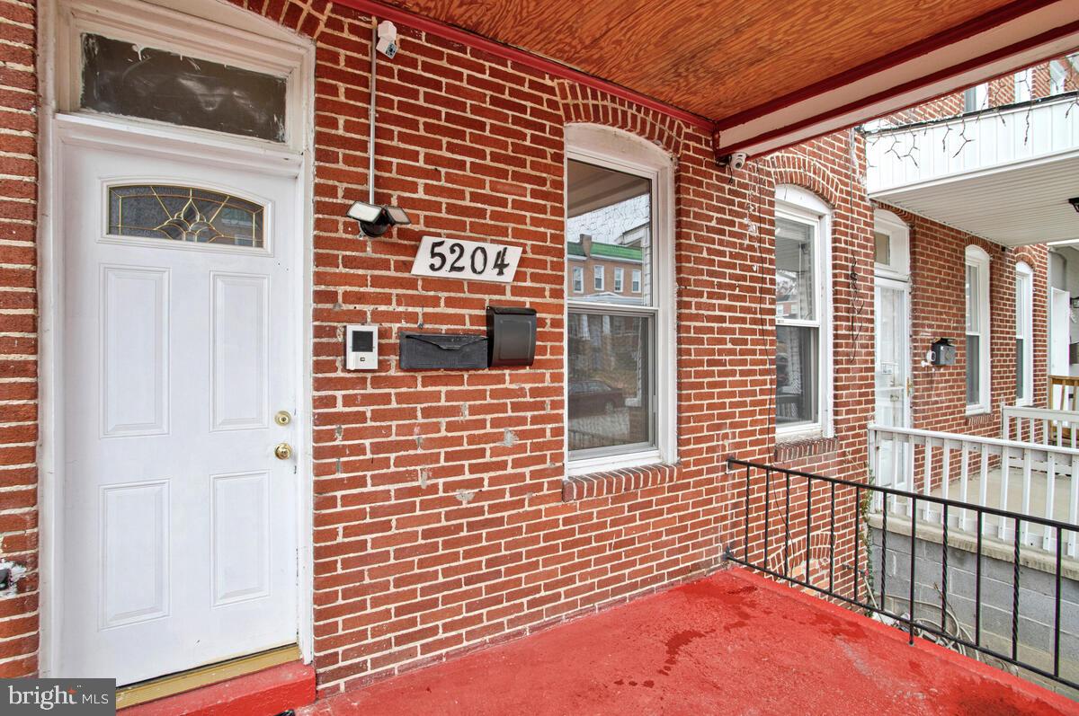 5204 Ivanhoe Avenue Baltimore, MD 21212 - Photo 2 of 38 a view of a brick wall