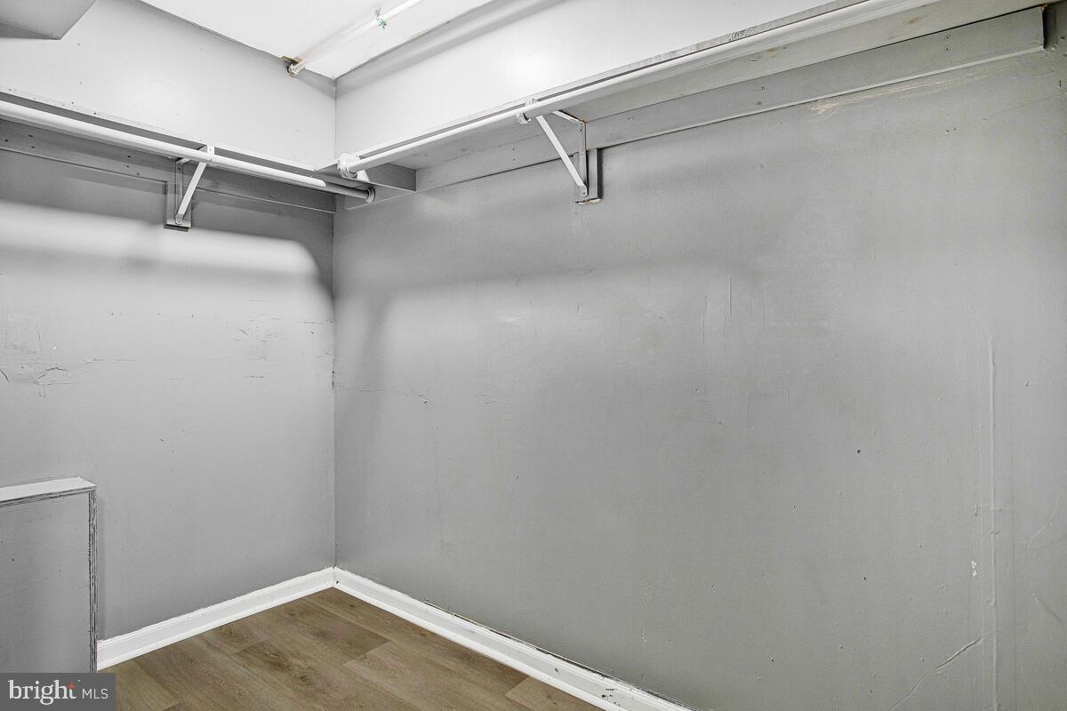 5204 Ivanhoe Avenue Baltimore, MD 21212 - Photo 30 of 38 a view of a room with racks on the wall