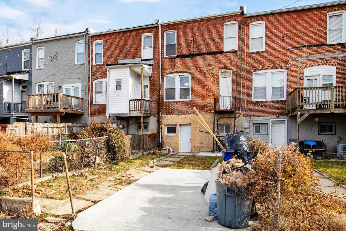 5204 Ivanhoe Avenue Baltimore, MD 21212 - Photo 36 of 38 a front view of a building with street view
