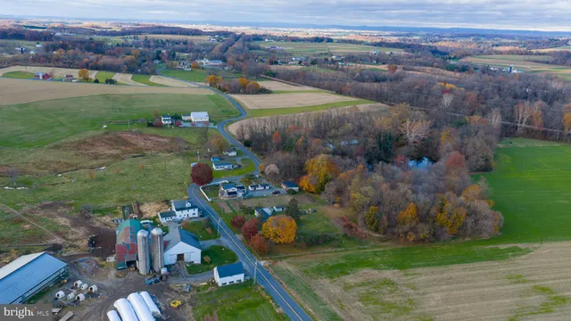 an aerial view of a house with a garden