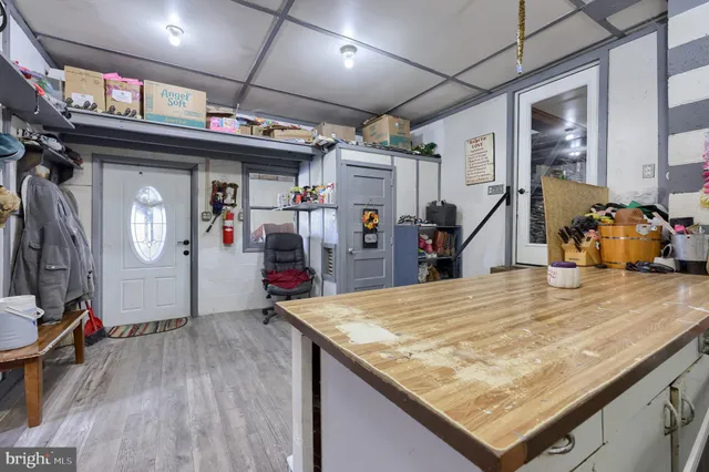 a view of a kitchen and dining room