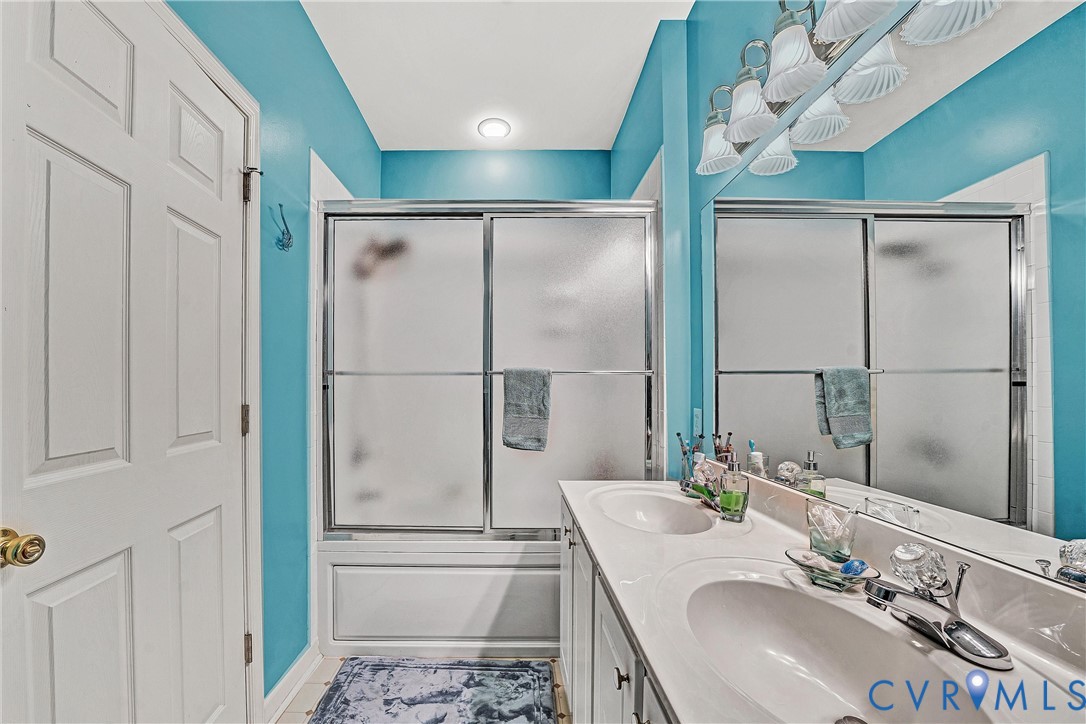 1103 Mariners Way Huddleston, VA 24104 - Photo 22 of 31 a bathroom with a sink and a mirror