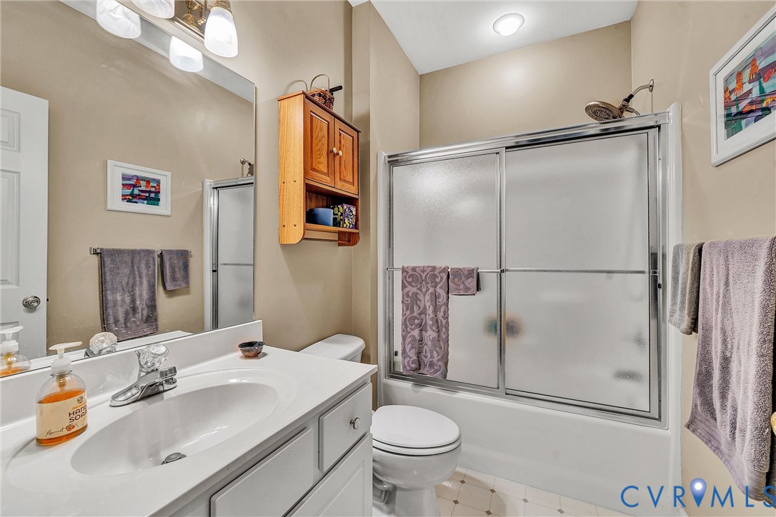 1103 Mariners Way Huddleston, VA 24104 - Photo 24 of 31 a bathroom with a sink toilet and shower