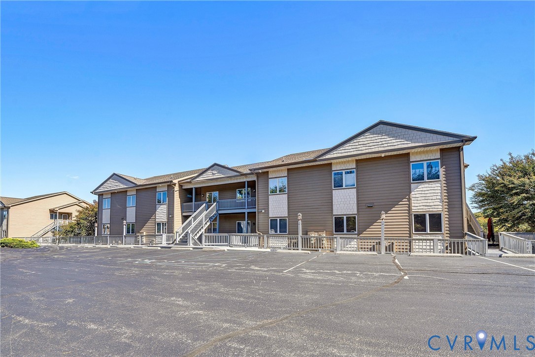 1103 Mariners Way Huddleston, VA 24104 - Photo 3 of 31 a front view of a house with a yard