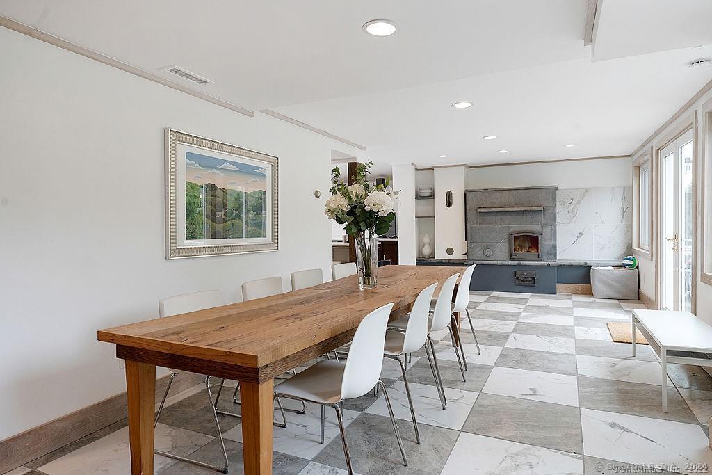 143 Melius Road Warren, CT 06754 - Photo 11 of 35 a view of a dining room with furniture
