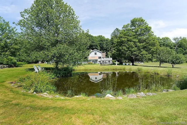a view of a lake with a building in the background
