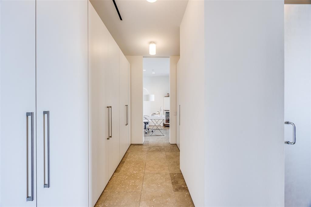 1717 Arts Plaza, Unit 1808 Dallas, TX 75201 - Photo 11 of 30 Corridor with light tile patterned floors