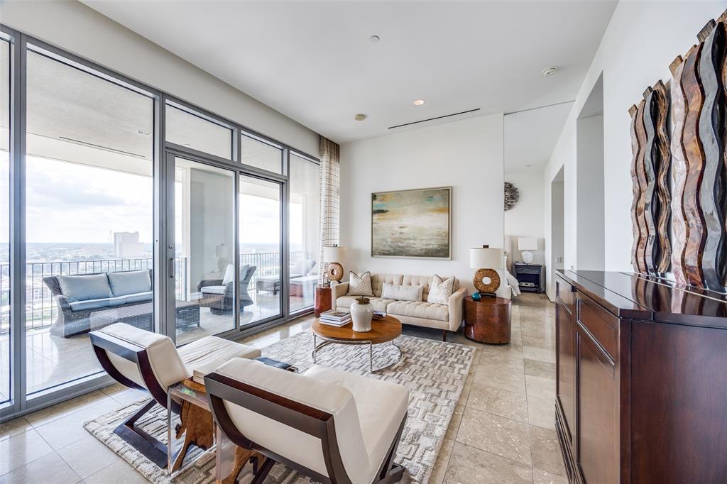1717 Arts Plaza, Unit 1808 Dallas, TX 75201 - Photo 4 of 30 Living area with light tile patterned floors