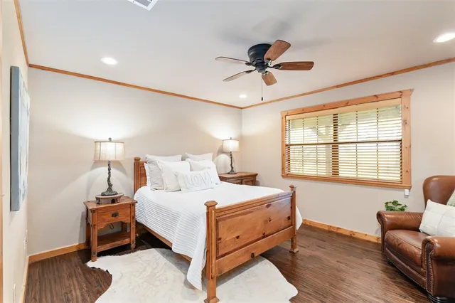 a bedroom with a bed and furniture