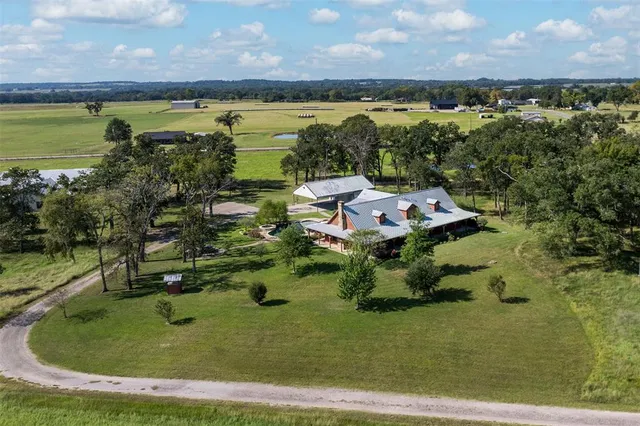 a view of a lake with a yard