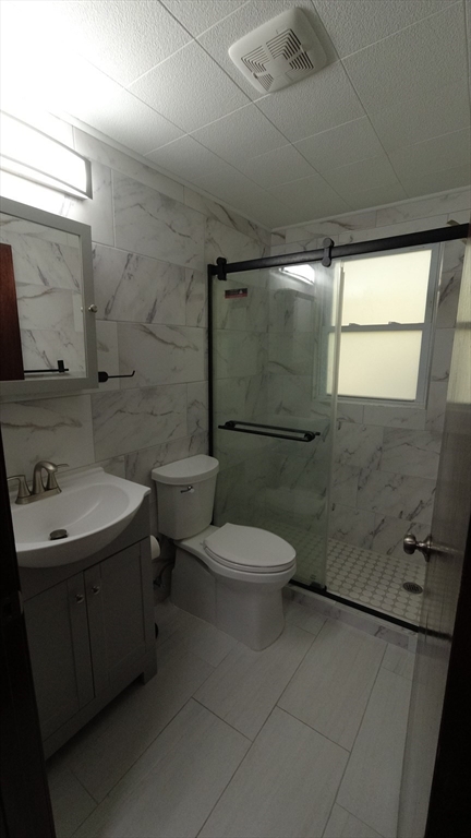 183-185 Middle Street Springfield, MA 01104 - Photo 27 of 27 a bathroom with a sink toilet and shower