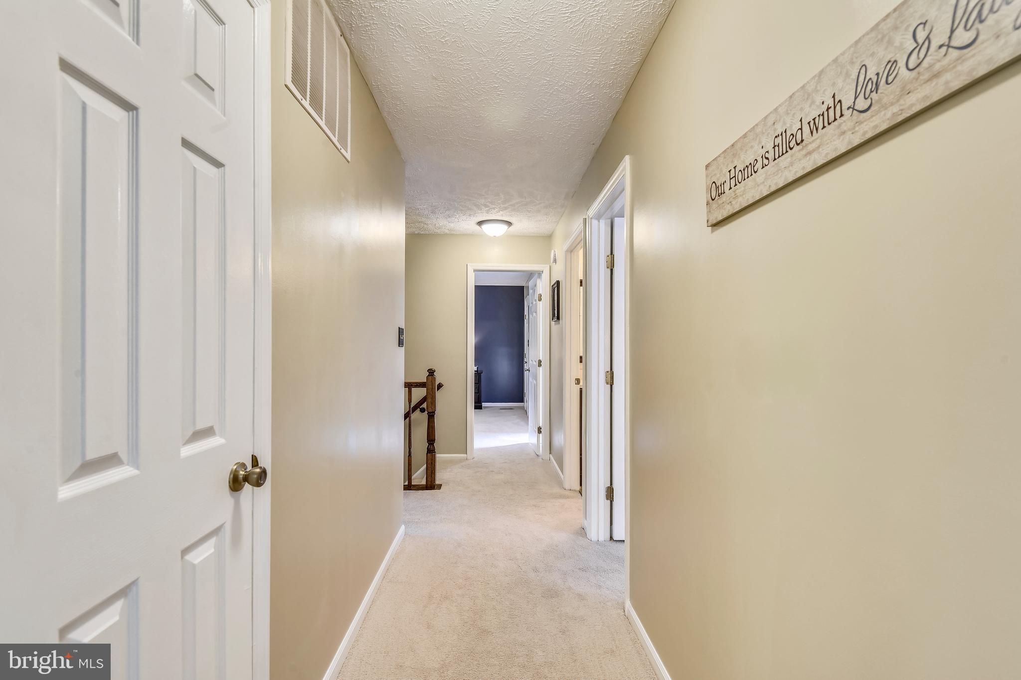 12613 Bridoon Lane Reston, VA 20191 - Photo 27 of 46 Upstairs Hallway