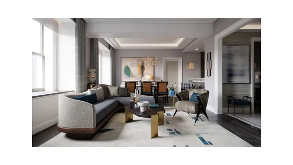 a living room with furniture and a potted plant