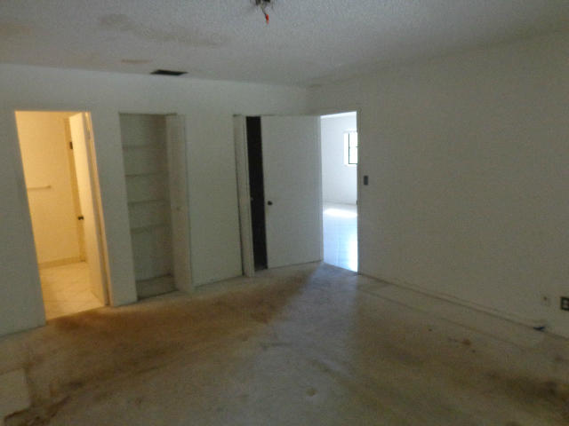 1501 Northwest 13th Street, Unit 4 Boca Raton, FL 33486 - Photo 8 of 12 Master bedroom