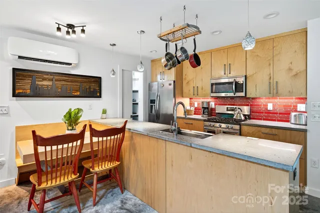 a view of a dining room with furniture