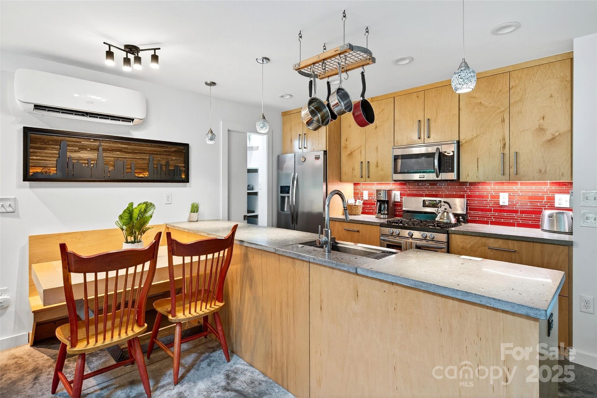 450 Lakey Gap Road Black Mountain, NC 28711 - Photo 12 of 48 a dining room with furniture and a flat screen tv