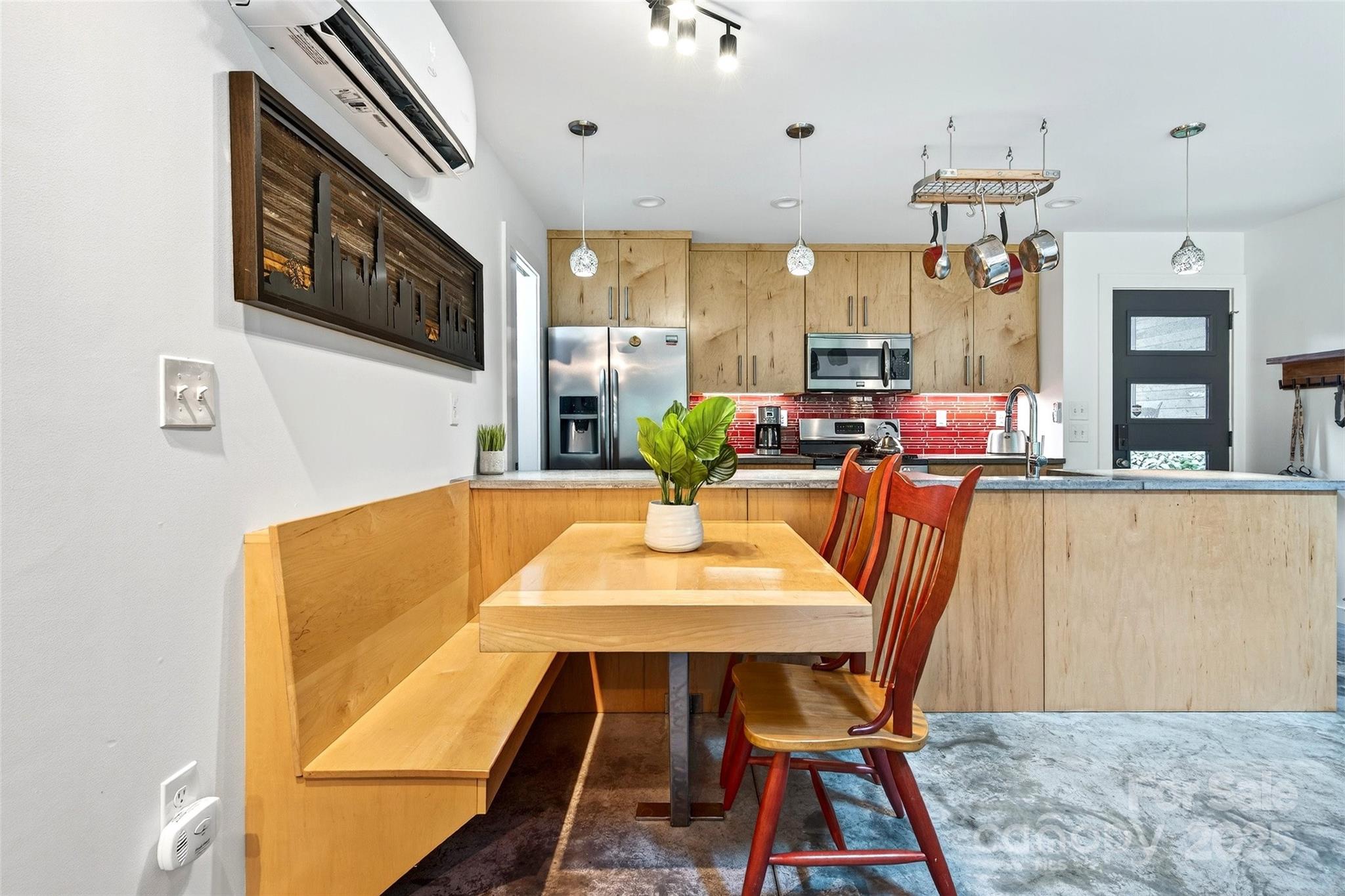 450 Lakey Gap Road Black Mountain, NC 28711 - Photo 13 of 48 a view of a dining room with furniture