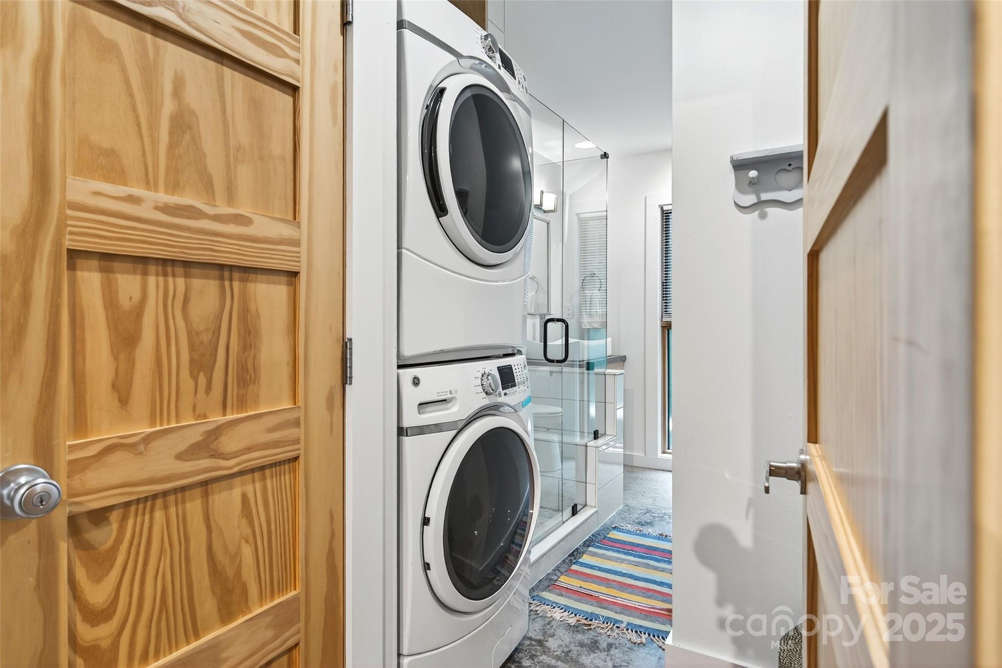 450 Lakey Gap Road Black Mountain, NC 28711 - Photo 20 of 48 a view of a storage and utility room with a washer dryer