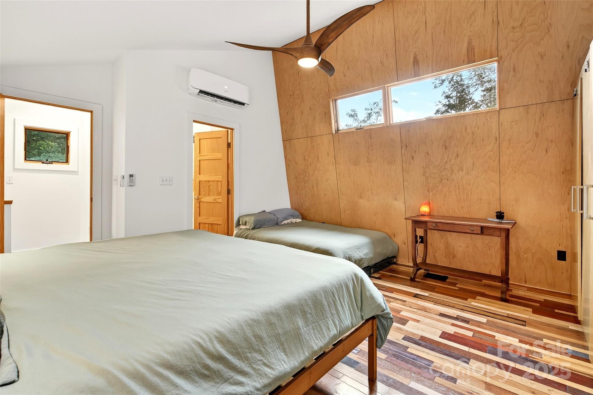 450 Lakey Gap Road Black Mountain, NC 28711 - Photo 24 of 48 a bedroom with a bed and a window