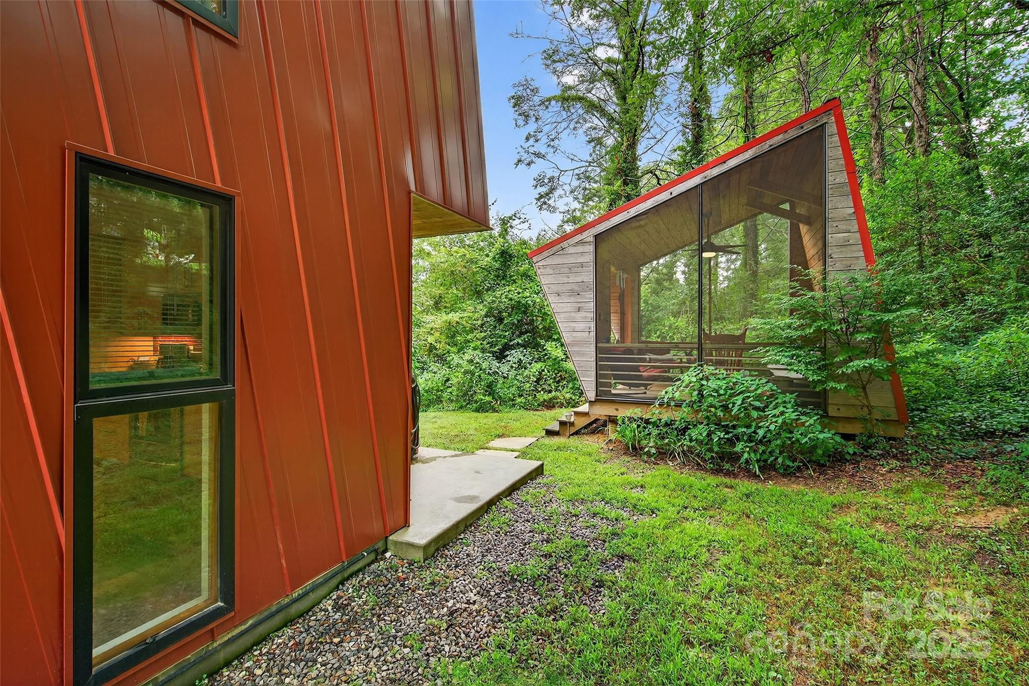 450 Lakey Gap Road Black Mountain, NC 28711 - Photo 30 of 48 a house view with a garden space