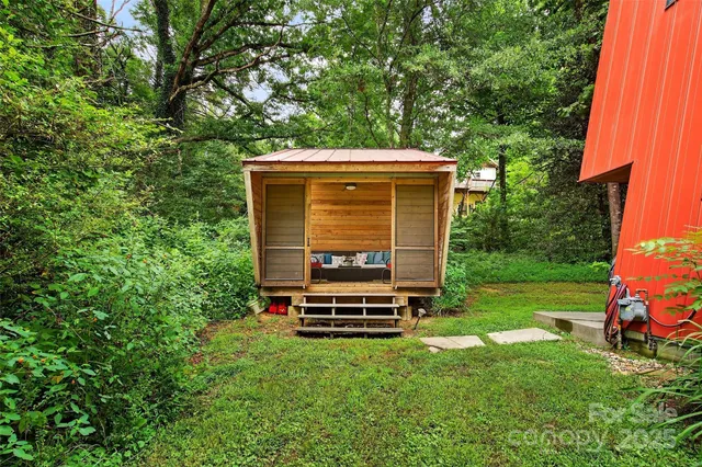a outdoor living space with patio furniture and a potted plant