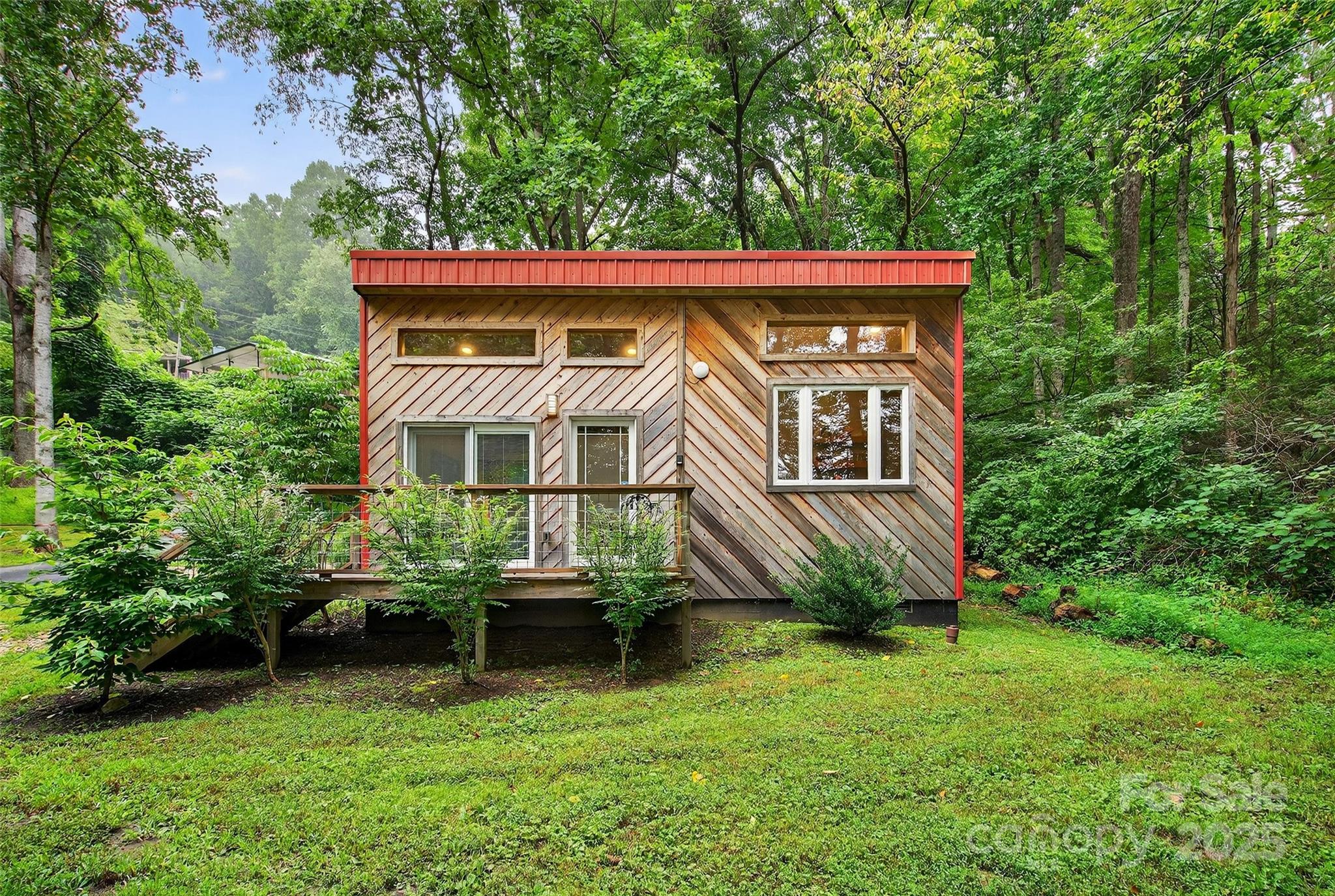 450 Lakey Gap Road Black Mountain, NC 28711 - Photo 36 of 48 a view of a house with a yard