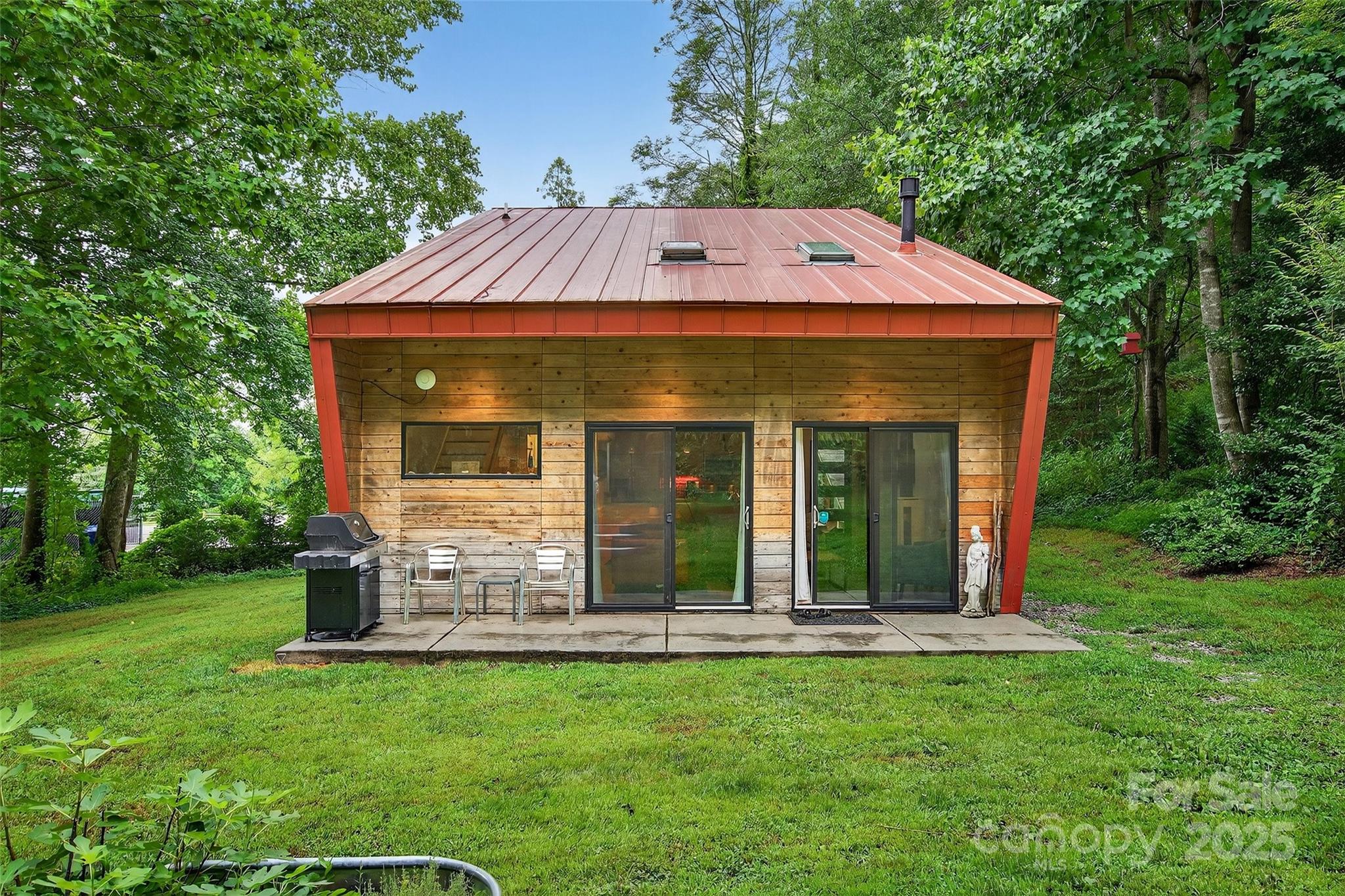 450 Lakey Gap Road Black Mountain, NC 28711 - Photo 4 of 48 a view of a house with backyard