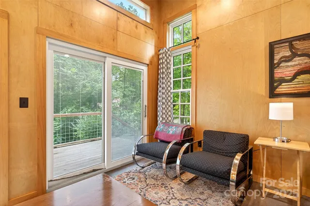 a kitchen with table and chairs