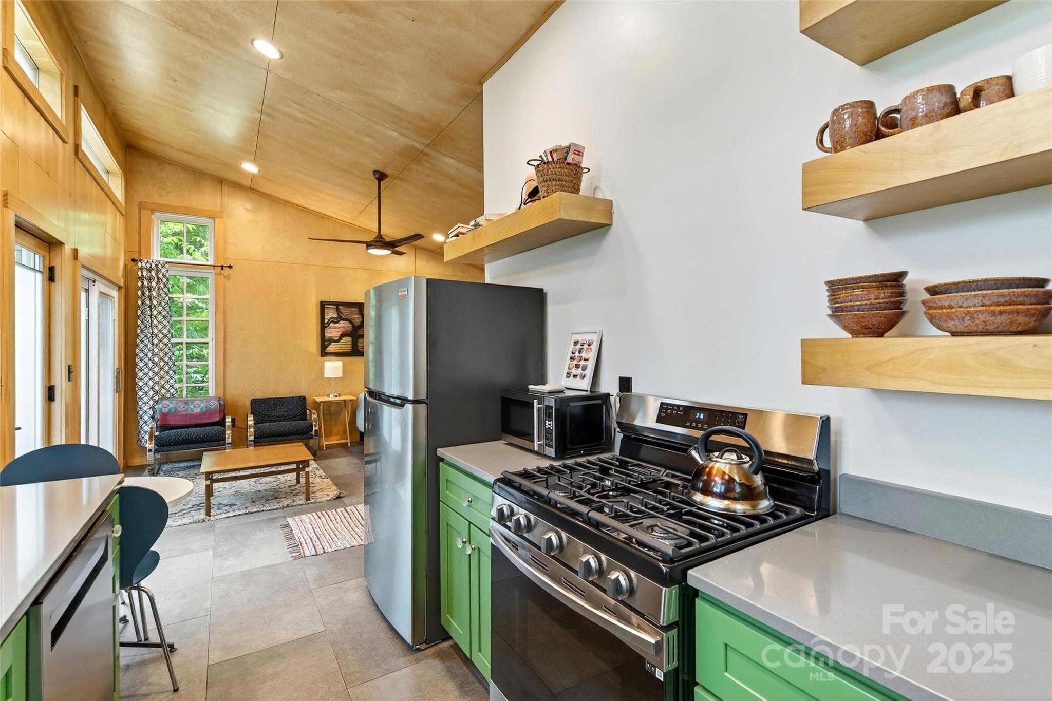 450 Lakey Gap Road Black Mountain, NC 28711 - Photo 43 of 48 a kitchen with table and chairs