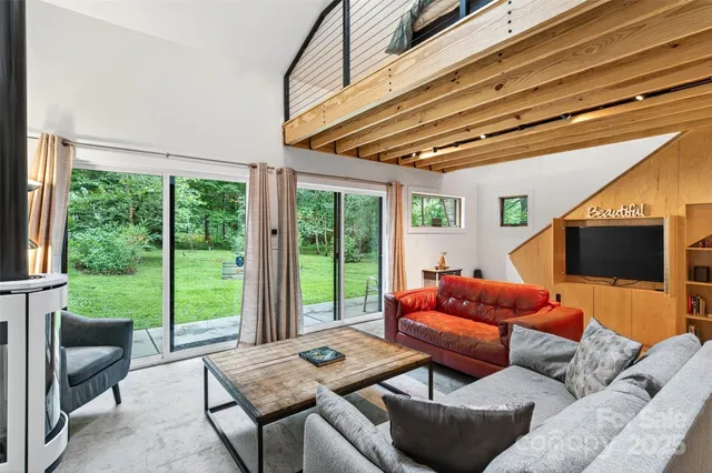 a living room with furniture and a couch