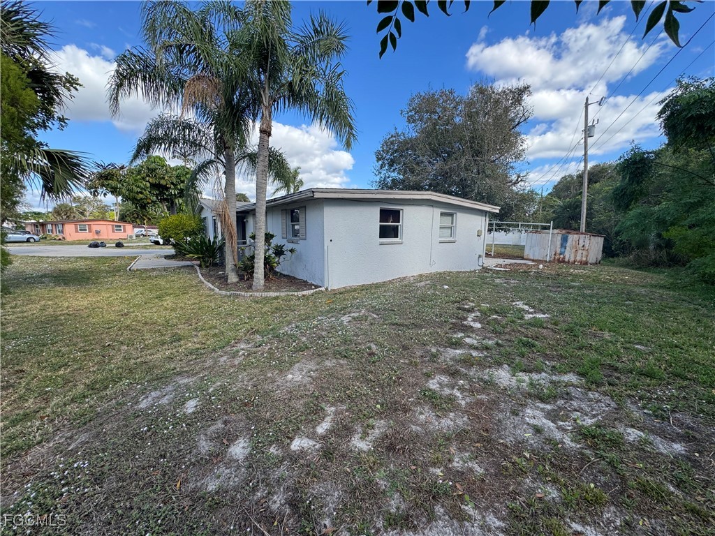 3724 Richard Road North Fort Myers, FL 33903 - Photo 1 of 17 a view of a house with a yard
